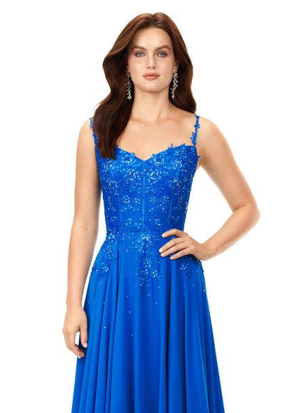 Ashley Lauren 11332 This classic chiffon prom, pageant and evening dress features a sweetheart neckline with spaghetti straps. The bustier on this dress is a corset style with lace appliques throughout. The lace appliques carry down onto the a-line skirt.