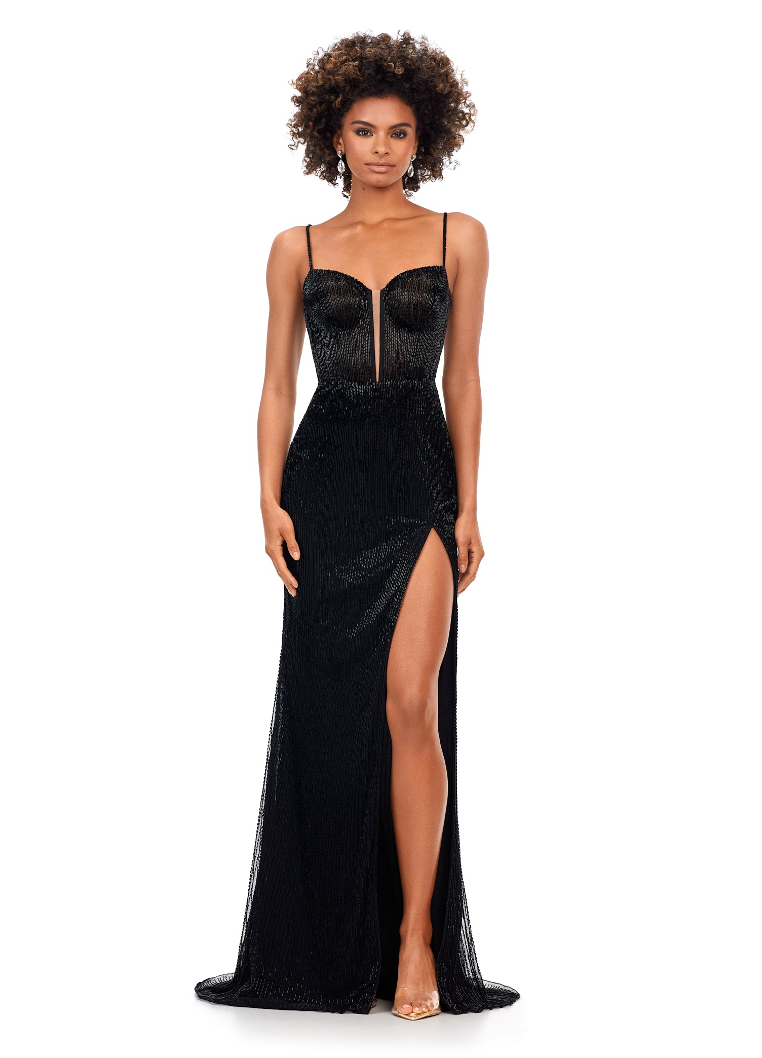 Ashley Lauren 11369 This Black liquid beaded style features an exposed bustier that is sure to accentuate your curves. The look is complete with sweep train and left leg slit.