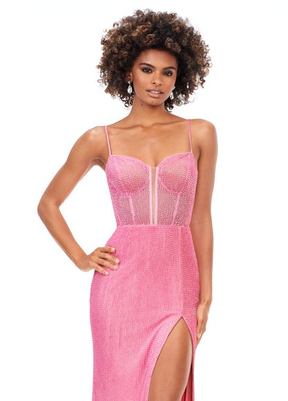 Ashley Lauren 11369 This Candy Pink liquid beaded style features an exposed bustier that is sure to accentuate your curves. The look is complete with sweep train and left leg slit.