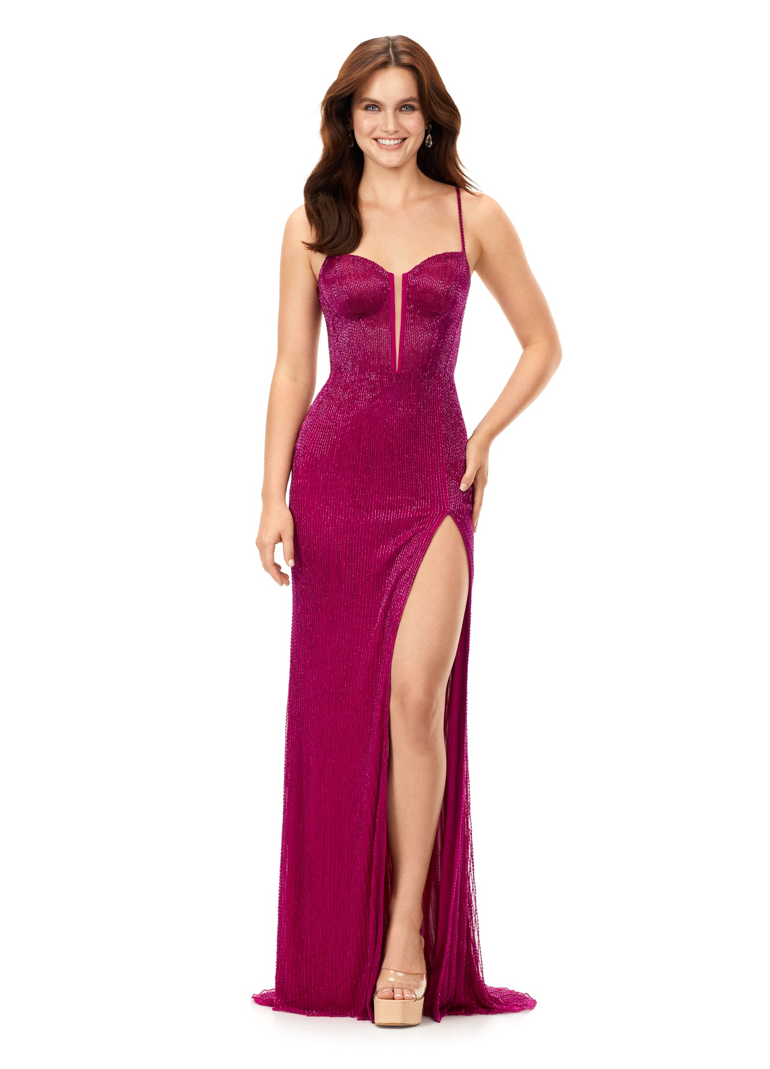 Ashley Lauren 11369 This Raspberry liquid beaded style features an exposed bustier that is sure to accentuate your curves. The look is complete with sweep train and left leg slit.