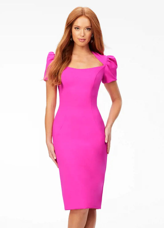 Ashley Lauren 4534 This stunning scuba cocktail dress features a modified square neckline with puff sleeves. The look is completed with a tea length fitted skirt and full zipper back.  Square Neckline Puff Sleeves Tea Length Skirt Fitted COLORS: Fuchsia, Royal, Yellow, Black