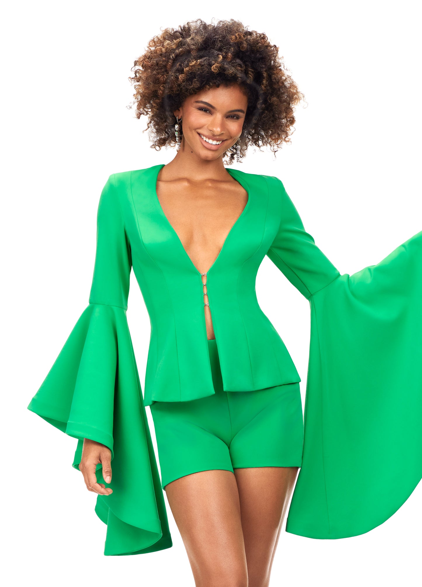 Ashley Lauren 4572 Make a statement in this fabulous two piece romper. The top features a deep v-neckline and dramatic bell sleeves. V-Neckline Bell Sleeves Two-Piece Romper COLORS: Fuchsia, Green, Neon Orange
