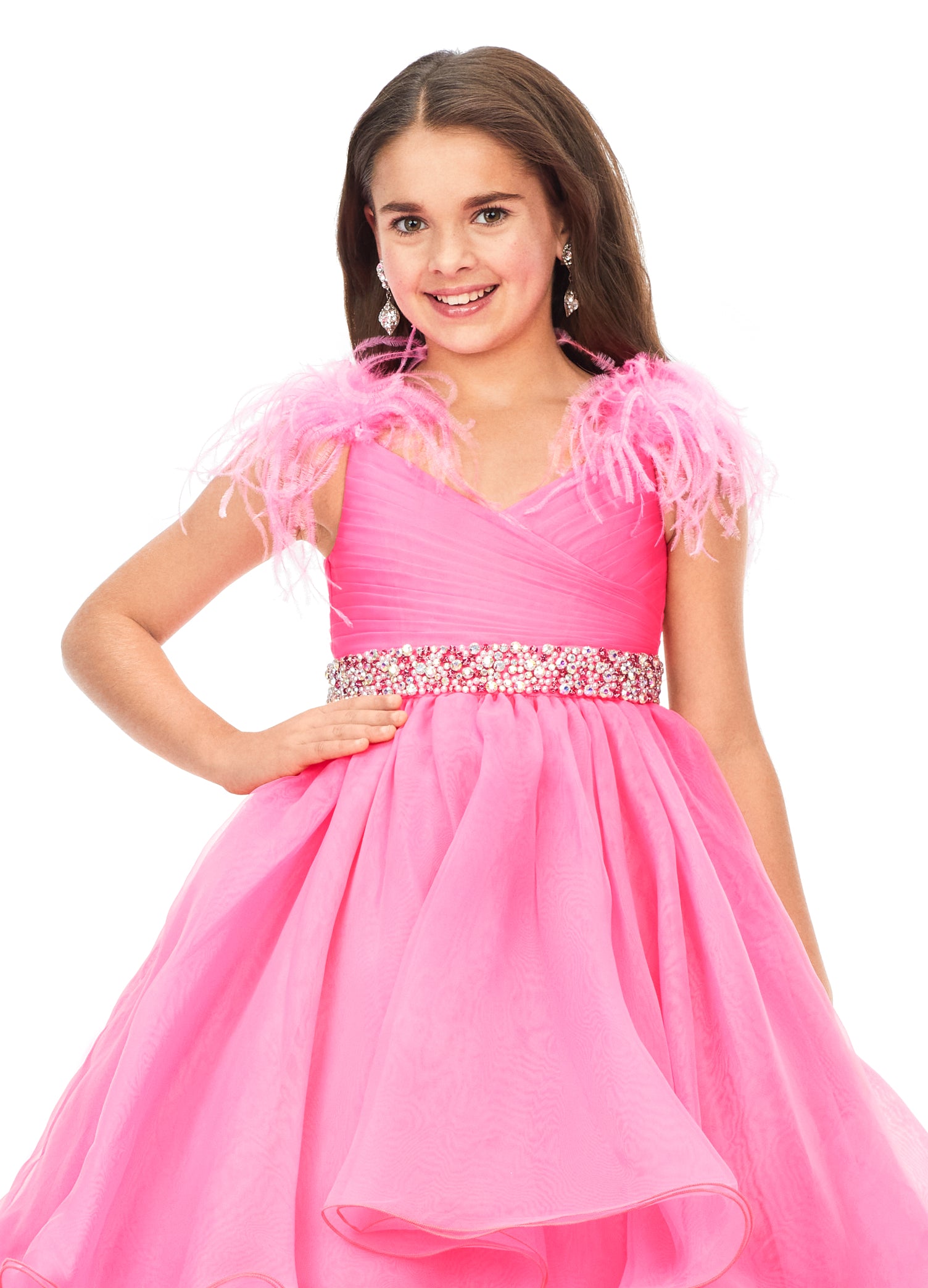 Ashley Lauren Kids 8184 Girls Pageant Dress Ball Gown with Feather Details  This organza kids ball gown features feather shoulders cascading to a crystal encrusted waistline. The layered skirt completes the look.