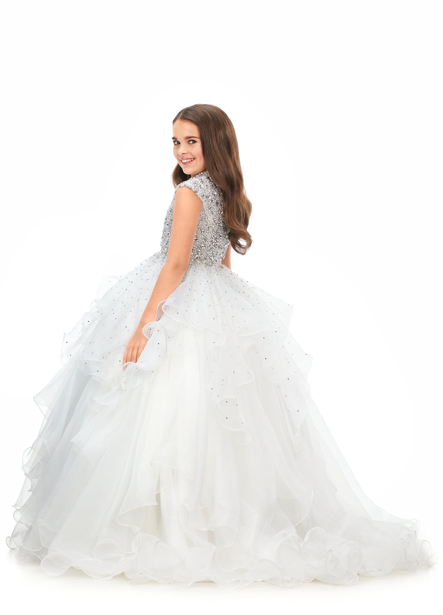 Ashley Lauren Kids 8180 Girls High Neckline Ball Gown with Organza Ruffle Pageant Skirt  Make them stop and stare in this kids high neckline ball gown with cap sleeves. The fully encrusted crystal and pearl bodice is sure to have all eyes on you. The a-line organza ruffle skirt is complete with scattered heat set stones throughout.