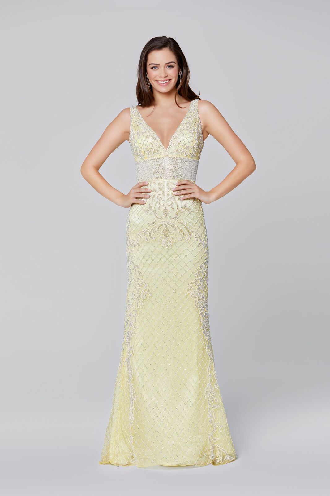 Primavera Couture 3425 is a Yellow Beaded Prom Dress, Pageant Gown, Wedding Dress & Formal Evening Wear gown. This is a fully beaded prom dress with a v neckline and horizontal beaded high waistline.    Yellow  size 4