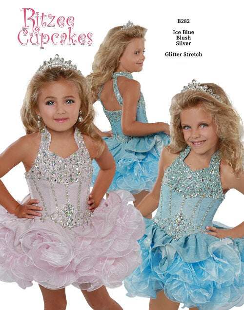 Ritzee Girls B282 is a glitter stretch shimmer Fabric material. Embellished top with AB Rhinestone Crystal Accents with a collar leading to an open cutout back. Lush Ruffle Layered Cupcake pageant Skirt. 282
