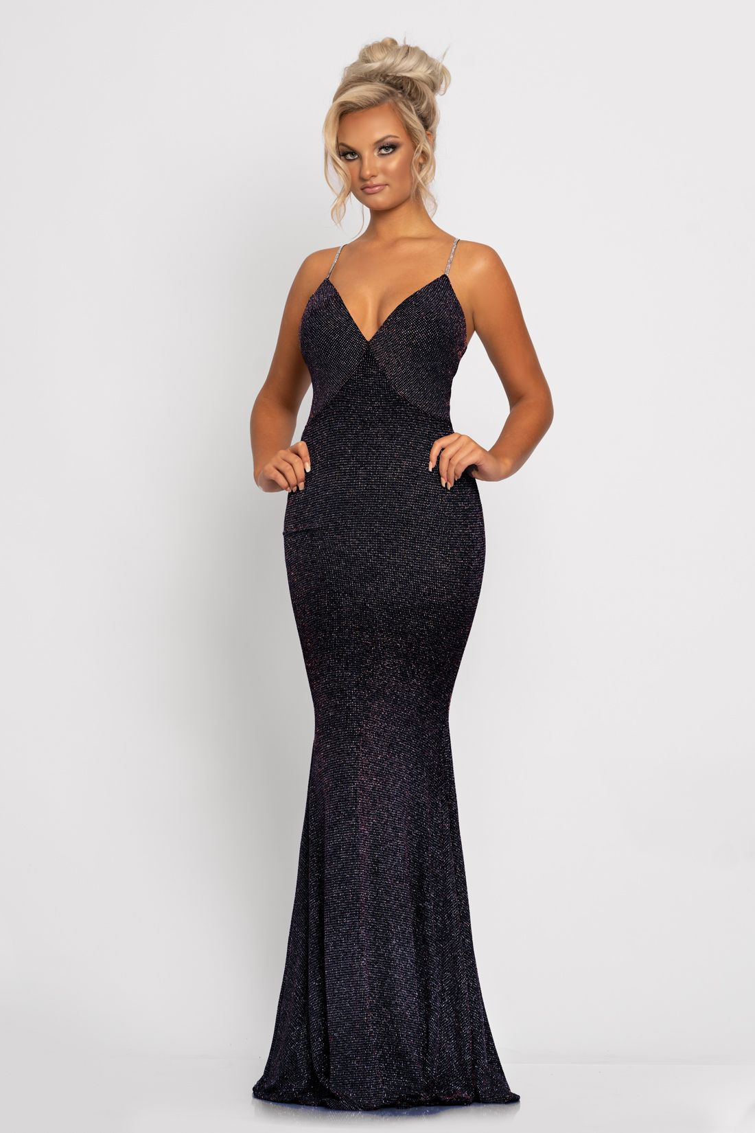Johnathan Kayne 2290 This long prom dress is glitter jersey with a v neckline and features an embellished spaghetti straps that form a racer back.   Colors  Blue, Gold  Size  00, 0, 2, 4, 6, 8, 10, 12, 14, 16