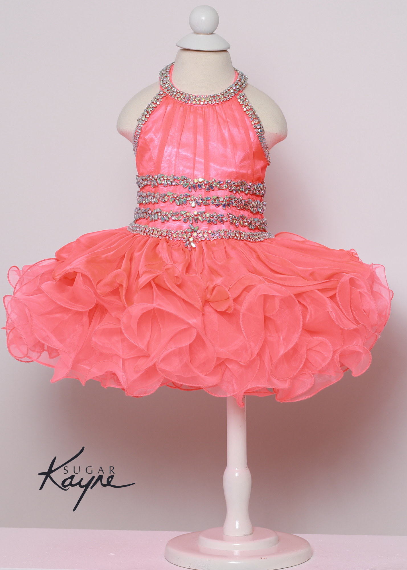 C216 Short girls Cupcake Ruffle High Neckline Pageant Dress Bow Crystal Embellished Have your little cupcake bring on all the charm in this stunning chiffon and organza gown. The corset back is the perfect addition as the little one grows!  Colors: Aqua, Hot Coral  Sizes:  0M, 12M, 18M, 24M, 2T, 3T, 4T, 5T, 6M, 6T  Fabric Chiffon, Organza, Satin Lining