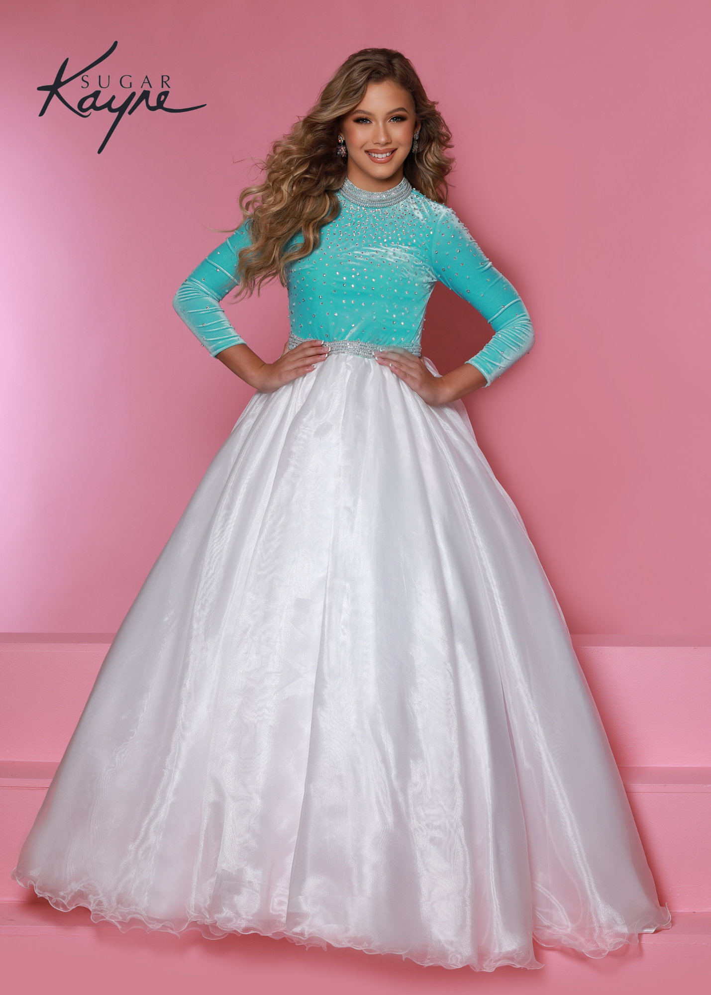 Sugar Kayne C306 Girls Long Sleeve Velvet Bodice Pageant Dress A Line Formal Gown Product Details Perfect in pearls. This long-sleeve color-blocked stretch velvet ballgown is the perfect addition to your closet for your next pageant! The collar and waistband are trimmed with rhinestone and pearls – OH MY!  Color Flamingo-White, Sky Blue-White  Size 2, 4, 6, 8, 10, 12, 14, 16  Fabric Stretch Velvet, Stretch Lining, Organza