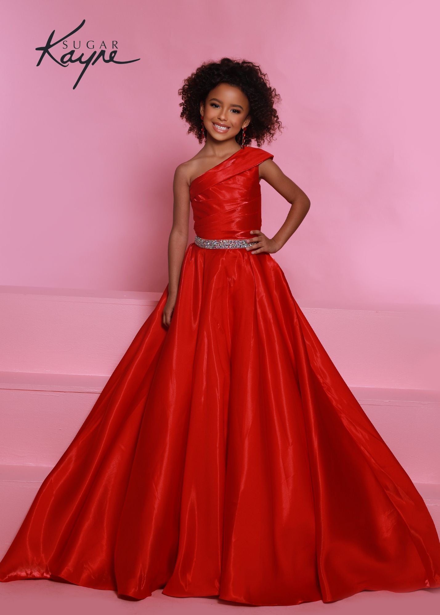 Sugar Kayne C312 Girls Long A Line One Shoulder Formal Pageant Dress Gathered Bodice Make a bold impression at your next pageant. This one-shoulder shimmer satin ball gown has a hand-beaded waistband to highlight the waist.  Colors: Cherry, White  Sizes: 2, 4, 6, 8, 10, 12, 14, 16  Fabric Shimmer Satin, Satin Lining