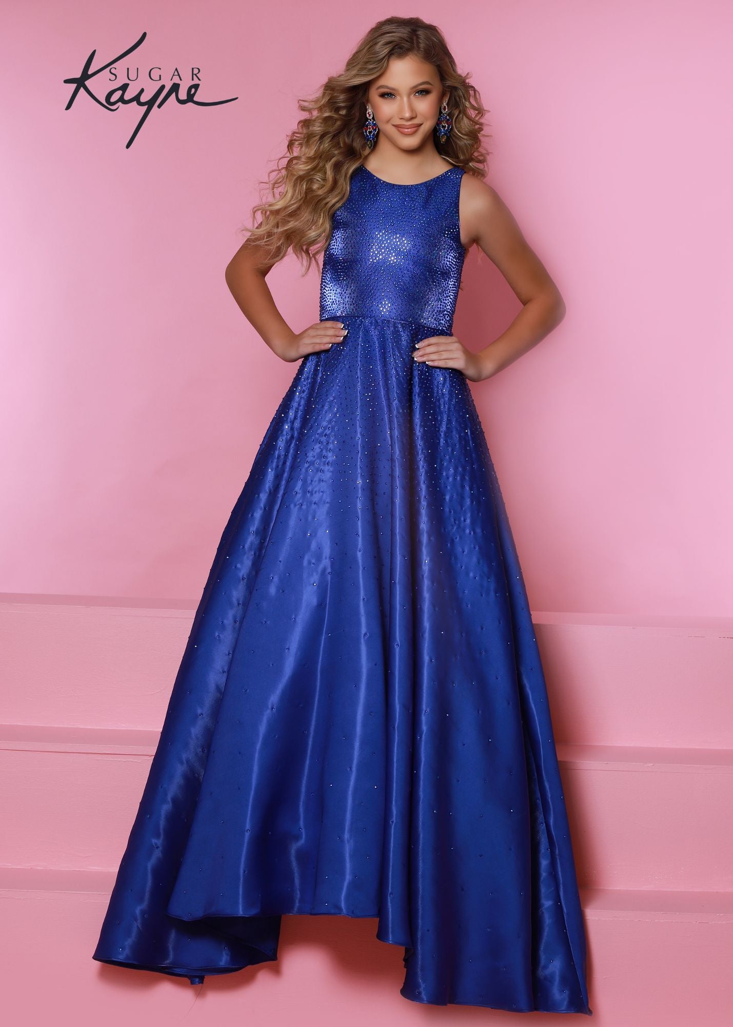 Sugar Kayne C322 Long Shimmer Satin A Line Girls Pageant Dress Embellished Gown Train Product Details Shine bright in this shimmer satin A-line gown! The bodice is fully beaded with hot-fix and gradually fades out throughout the skirt. The long train will glide beautifully across the stage.  Colors: Aqua, Royal, Red, White  Sizes: 2, 4, 6, 8, 10, 12, 14, 16  Fabric Shimmer Satin, Satin Lining