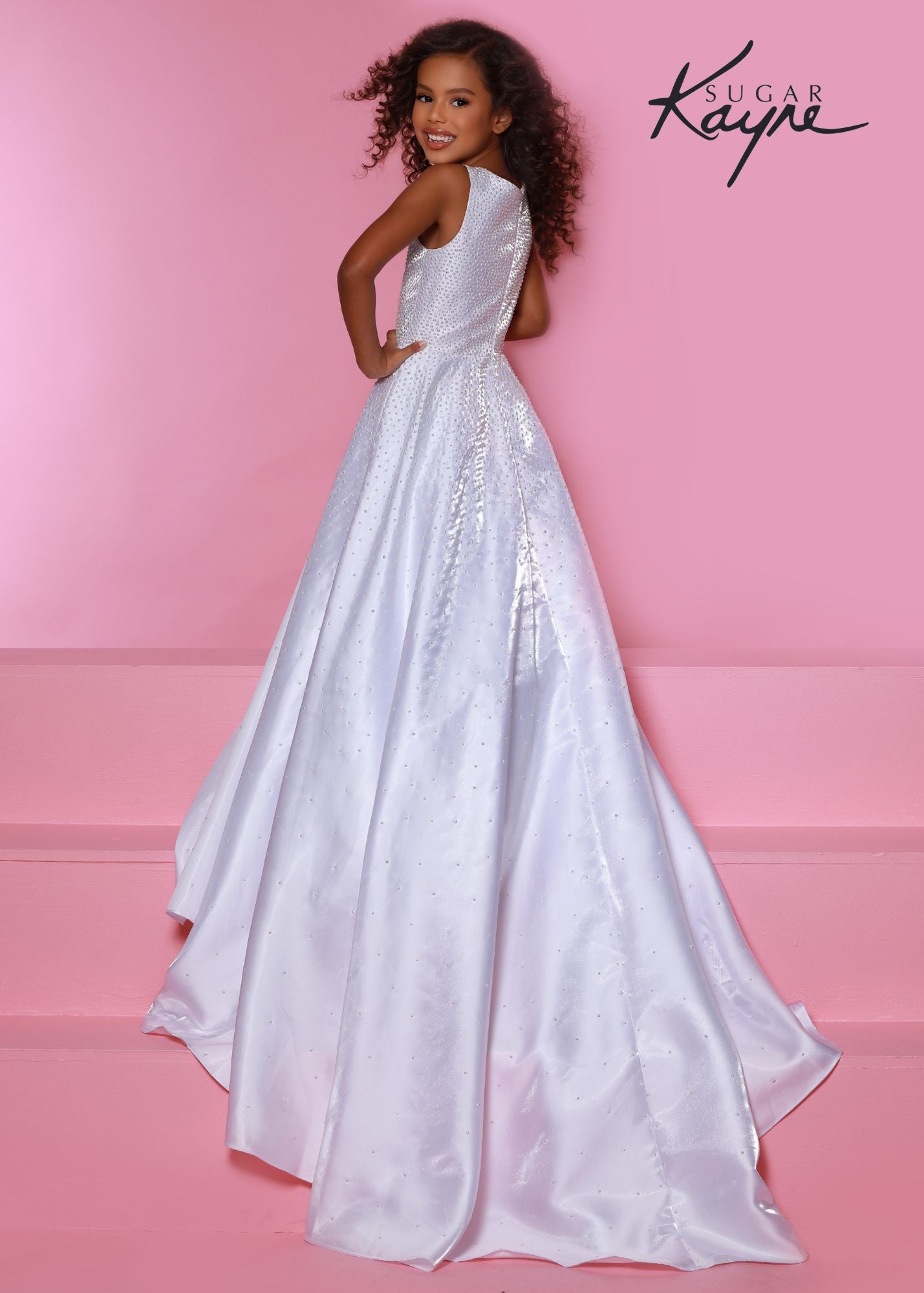 Sugar Kayne C322 Long Shimmer Satin A Line Girls Pageant Dress Embellished Gown Train Product Details Shine bright in this shimmer satin A-line gown! The bodice is fully beaded with hot-fix and gradually fades out throughout the skirt. The long train will glide beautifully across the stage.  Colors: Aqua, Royal, Red, White  Sizes: 2, 4, 6, 8, 10, 12, 14, 16  Fabric Shimmer Satin, Satin Lining