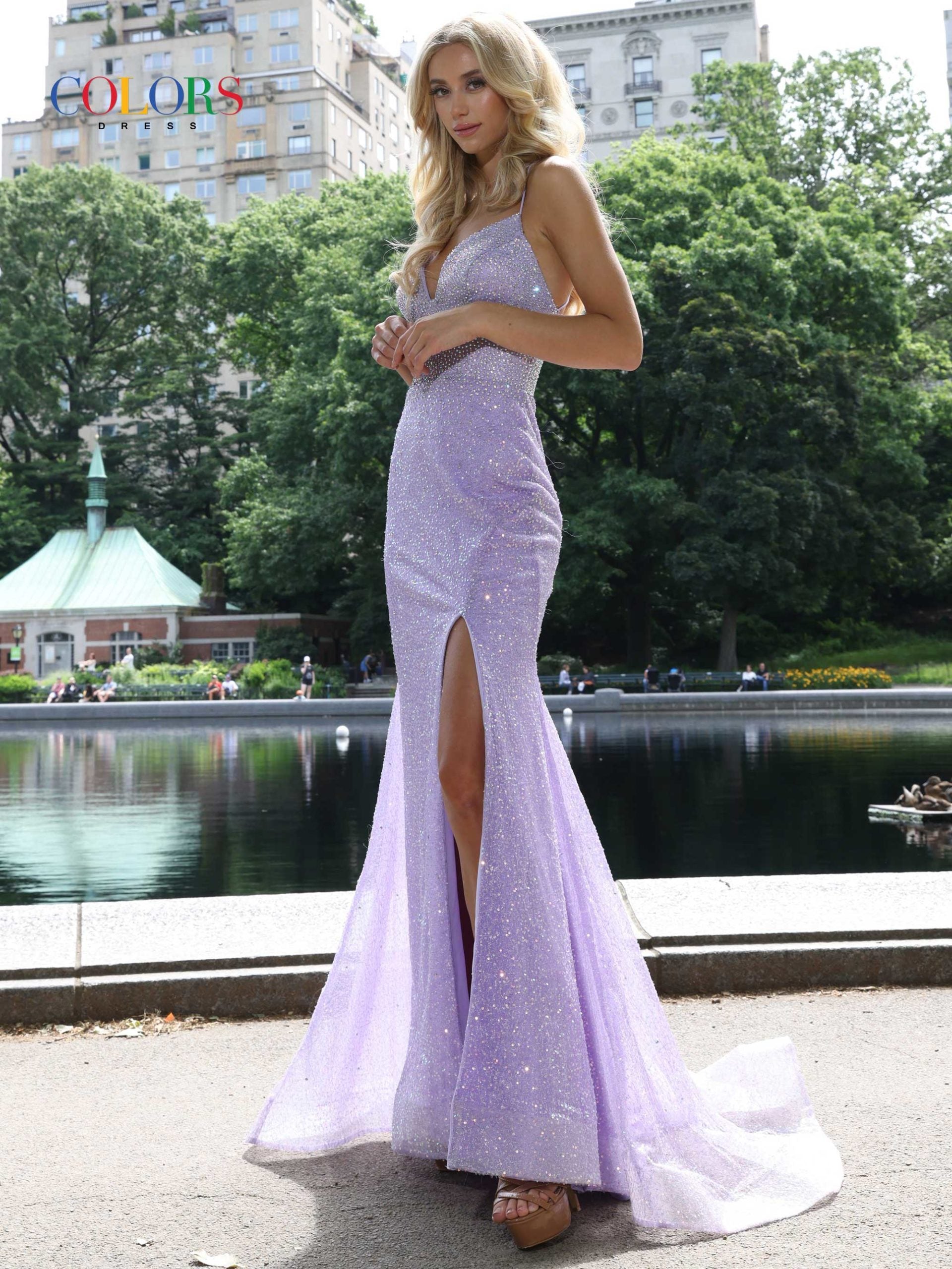 Colors Dress 2951 Lavender Prom, Pageant and Formal Evening Dress This is a sparkly glitter long evening prom dress with a v neckline and slit.