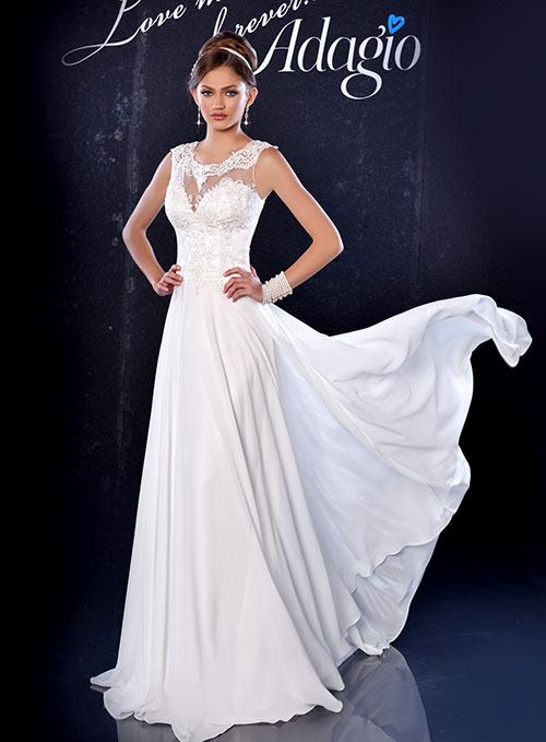 Adagio Bridal D9163 is a long flowing Chiffon wedding dress. Featuring a Sheer Lace Illusion Neckline with a Lace embellished bodice and cut out open back. sweeping train. Stunning destination bridal gown.