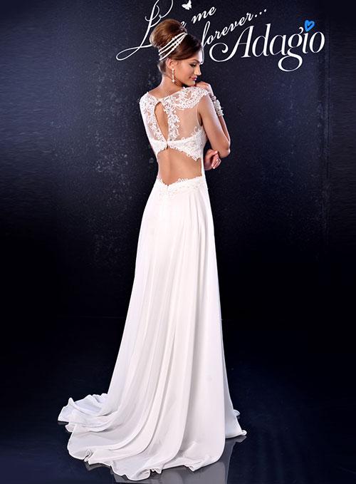 Adagio Bridal D9163 is a long flowing Chiffon wedding dress. Featuring a Sheer Lace Illusion Neckline with a Lace embellished bodice and cut out open back. sweeping train. Stunning destination bridal gown. Category wedding dresses bridal gowns destination bridal gowns 