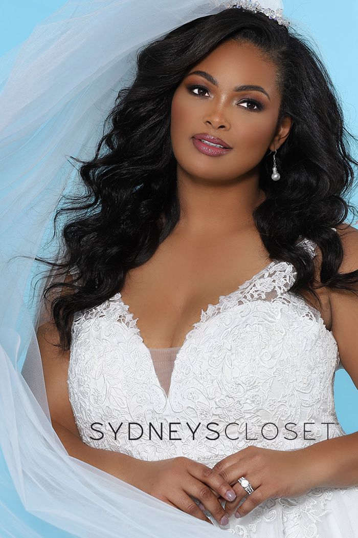 Sydney's Closet SC 5230 Kelly Anne Be a beautiful curvy bride in a floral lace embroidered wedding dress in simple, modern A-line design. Magnificent hand beaded belt accentuates your curves. Deep V-neck adds a modern design element. Lace appliques with clear sequins create just a hint of sparkle in the bodice and tulle skirt. Designer Sydney's Closet Style SC5230 for full figure brides sizes 14 to 40.