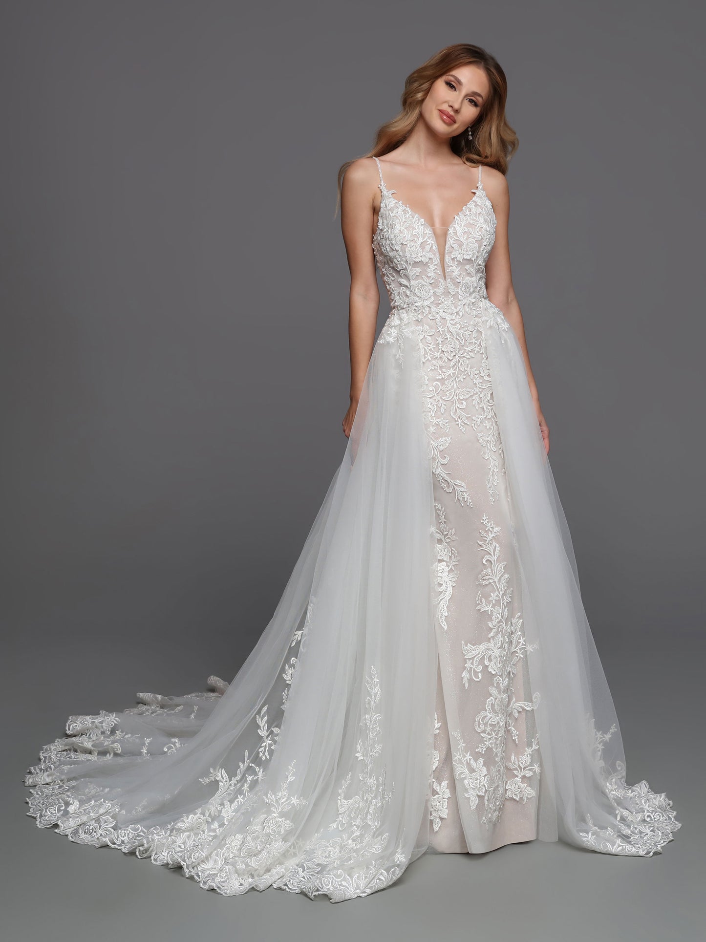 DaVinci Bridal 50720 Lace Wedding Dress Column Detachable Overskirt V Neckline Sheer Back  This is a long beautiful wedding dress with a deep v neckline and sheer panel.  The back is mid back and has sheer lace.  It is a long column bridal gown with a long train. 