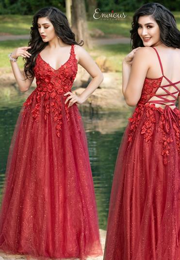Envious Couture E1628 V neckline prom dress with 3D floral details on the sheer bodice that flow down the glitter tulle ballgown skirt.  This evening gown has a lace up corset tie in the open back. Make a statement at your next formal event, pageant or prom.  Available colors  Wine, Nude, Royal  Available sizes  00, 0, 2, 4, 6, 8, 10, 12, 14, 16, 18, 20