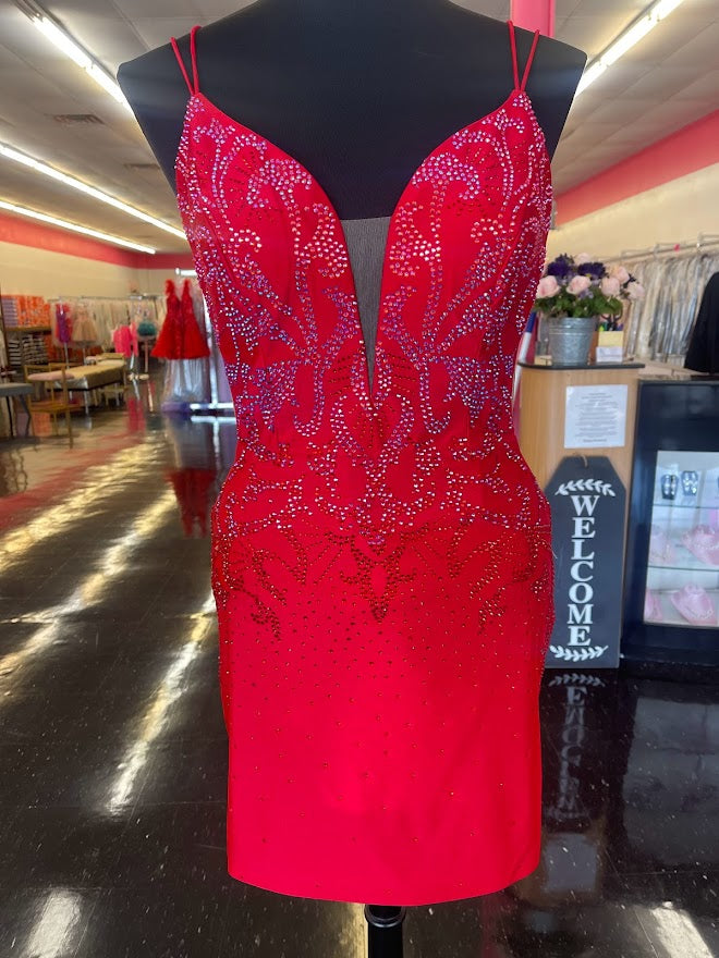 Amarra 87148 is a Short fitted Jersey Formal Cocktail Dress. Rhinestones Embellish the bodice of this gown in a scrolling pattern. Sheer mesh side panels and an open back with a lace up corset closure. Great Homecoming Gown!  Red sizes 8, 12