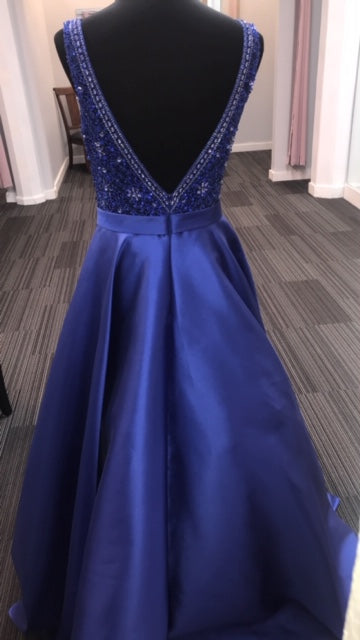 JVN67198 Royal Sizes 6  In Stock prom dress Beaded fitted bodice, plunging V neck with sheer mesh insert, sleeveless, V back, floor length a line pleated skirt, sweeping train evening gown. Pockets!!