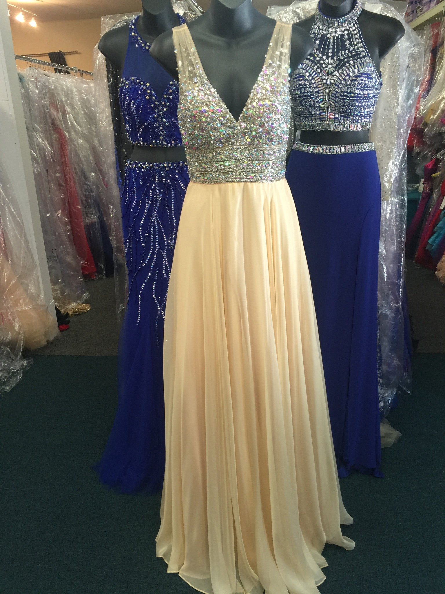 JVN20437 ﻿Stunning chiffon flowy prom dress features sheer v neck beaded top. Makes a beautiful pageant gown.  In stock in light yellow size 0.