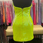 Ashley Lauren 4520 Neon Blue cocktail dress.  This little dress is Strapless and has petite sequin fabric with a v neckline and peaks.  It features a fitted skirt with exposed zipper back.  Neon Green size 4