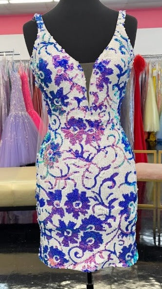 Jovani 09738 Short Fitted Floral Sequin Formal Cocktail Dress Plunging V Neck Backless Gown Short form fitting white blue floral sequin design Jovani homecoming dress 09738 features sleeveless bodice with plunging neckline with sheer mesh insert.  Available Sizes: 00,0,2,4,6,8,10,12,14,16,18,20,22,24  Available Colors: White/Blue, White/Hot Pink, White/Purple