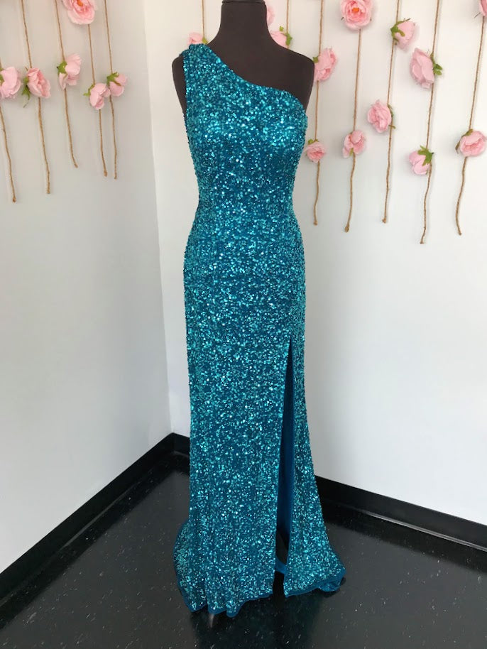 Ashley Lauren 11144 Sequin One Shoulder Prom Dress with Lace up Back  Dazzle the night away in this one shoulder sequin gown featuring an asymmetrical lace up back and left leg slit.  One Shoulder Asymmetrical Lace Up Back Left Leg Slit Fully Hand Beaded Colors:  Peacock Sizes:  14