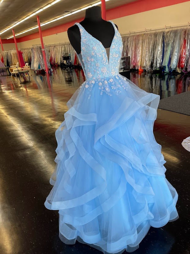 Amarra 87334 Long Layer Ruffle A Line Ball Gown Prom Dress Sequin Pageant  Ruffles, sparkles, tulle, and more! AMARRA 87334 is a one-of-a-kind, bold design that embodies everything we love about getting dressed up and feeling glamorous. This ball gown features a v-neckline with a mesh insert and breathtaking floral sequin throughout the bodice