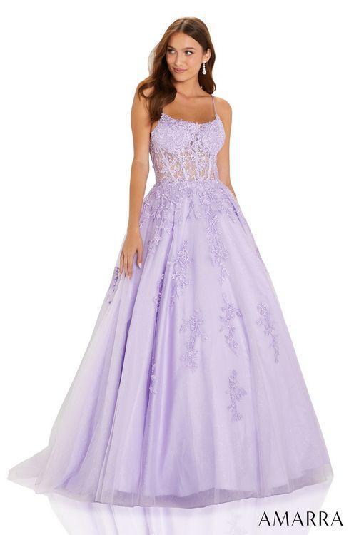 Amarra 88584 Long Shimmer Lace A Line Ballgown Prom Dress Sheer Corset Pageant Gown AMARRA 88584 is a breathtaking ball gown for an amazing prom experience. This design is elegant and chic with its tulle and lace embroidered pattern, sheer bodice, and corset-style lace-up back. It has shimmery rhinestones on the bodice to add some shine to your look and turn heads with every step.