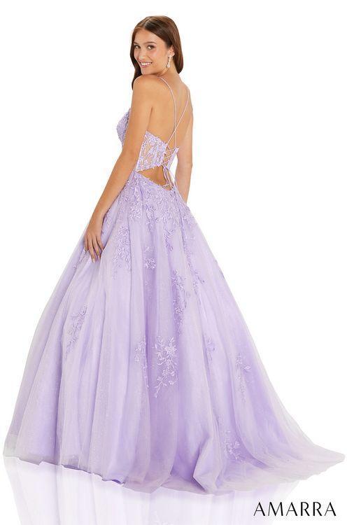 Amarra 88584 Long Shimmer Lace A Line Ballgown Prom Dress Sheer Corset Pageant Gown AMARRA 88584 is a breathtaking ball gown for an amazing prom experience. This design is elegant and chic with its tulle and lace embroidered pattern, sheer bodice, and corset-style lace-up back. It has shimmery rhinestones on the bodice to add some shine to your look and turn heads with every step.