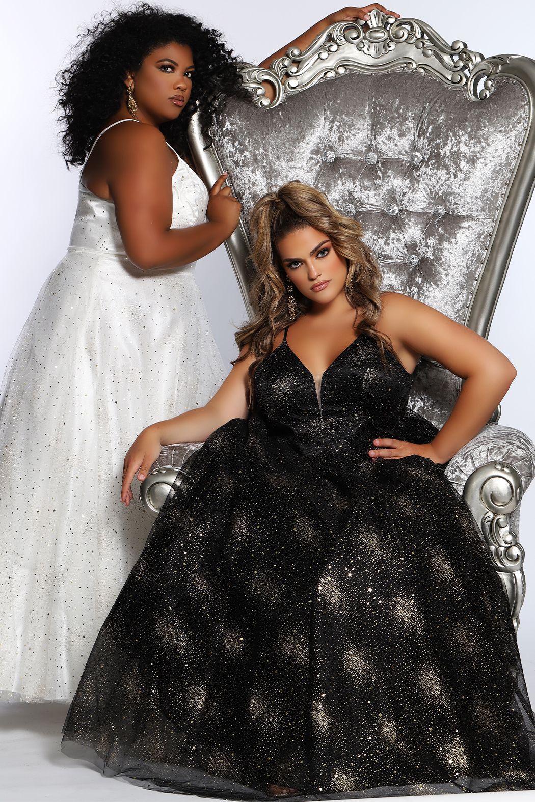 Sydney's Closet SC7327 Stunning in Black or Ivory, this prom dress has delicate details of adjustable spaghetti straps into the lace-up back with modesty panel offers the perfect amount of support. The bodice and full a line skirt shines under the lights with gold stars, moons, and glitter. Made even better with phone-friendly pockets. SC 7327