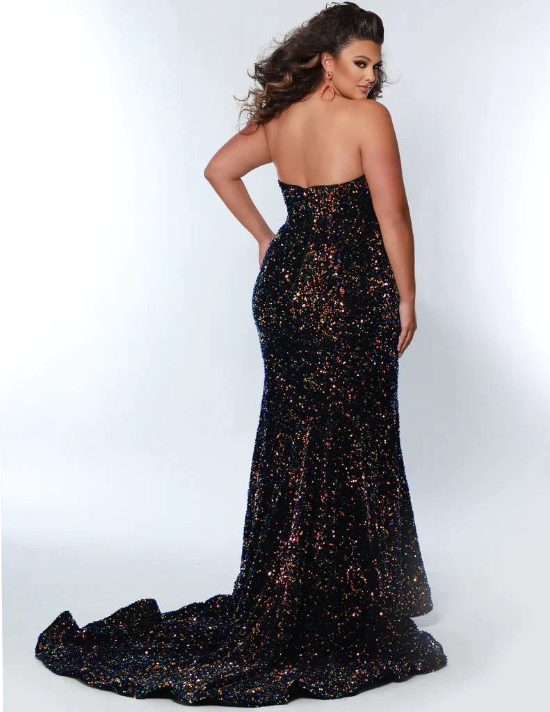 This Sydney's Closet JK2313 Long Plus Size Mermaid Velvet Sequin Prom Dress features a detachable off the shoulder sleeve and is designed to flatter all body types. The 100% polyester fabric has subtle sequins and a stretchy velvet finish that ensures a comfortable fit.   Sequin piettes on stretch velvet Mermaid/Fitted silhouette Sweetheart neckline Detachable drape sleeve