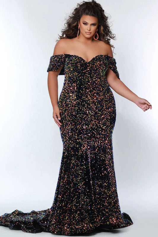 This Sydney's Closet JK2313 Long Plus Size Mermaid Velvet Sequin Prom Dress features a detachable off the shoulder sleeve and is designed to flatter all body types. The 100% polyester fabric has subtle sequins and a stretchy velvet finish that ensures a comfortable fit.   Sequin piettes on stretch velvet Mermaid/Fitted silhouette Sweetheart neckline Detachable drape sleeve