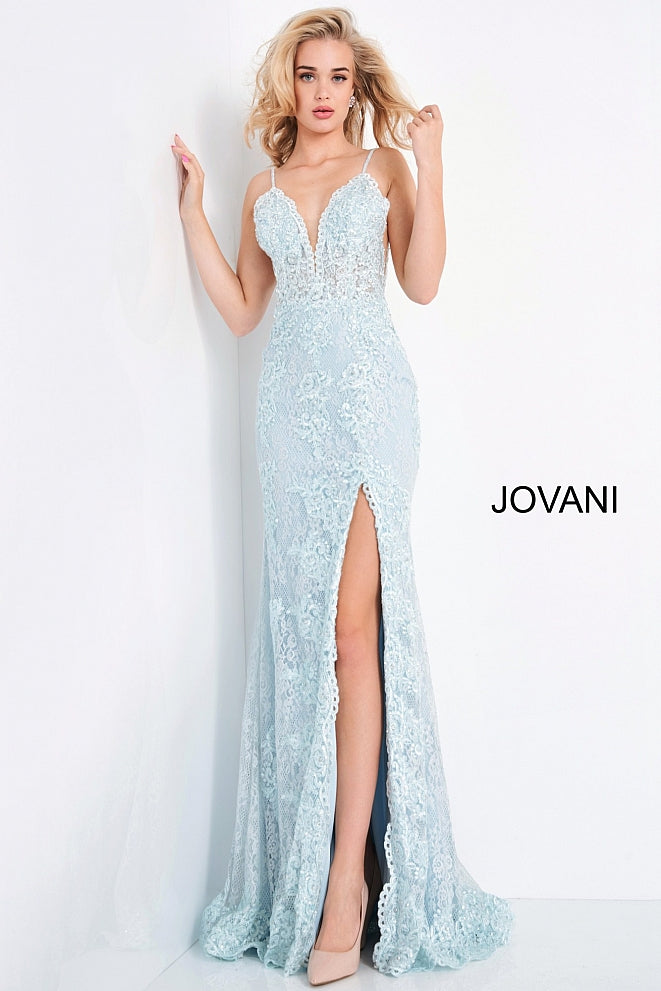 Jovani JVN00864 is an absolute stunner! Long Fitted Prom Dress or Unique Sexy Wedding Dress. Delicately Embellished Lace with a Plunging neckline & High Slit with scallop lace edges. Spaghetti straps with a slightly sheer lace bodice. JVN 00864