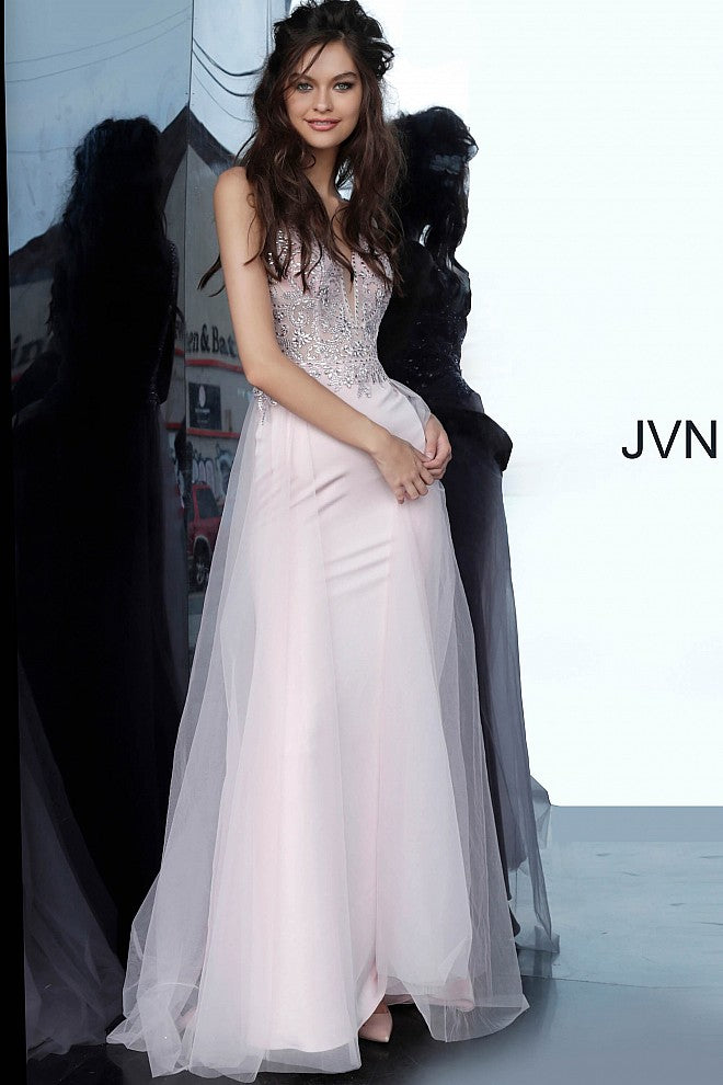 JVN 02253 is a long fitted Prom Dress with a sheer Embellished bodice with a Deep V Plunging Neckline with a mesh insert. Features an open V Back. Fitted Skirt has a tulle overlay overskirt with embellishments cascading from the bodice to add a soft transition. Great pageant gown or Dress for any formal event!