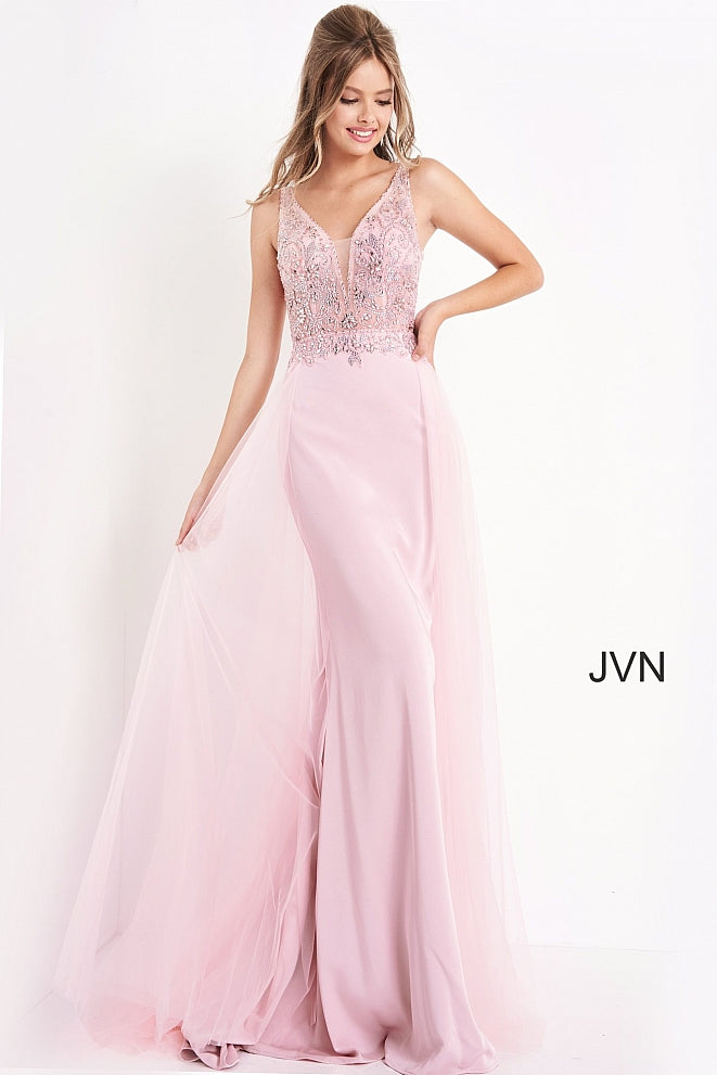 Jovani JVN02253 is a long fitted Prom Dress with a sheer Embellished bodice with a Deep V Plunging Neckline with a mesh insert. Features an open V Back. Fitted Skirt has a tulle overlay overskirt with embellishments cascading from the bodice to add a soft transition. Great pageant gown or Dress for any formal event! JVN 02253