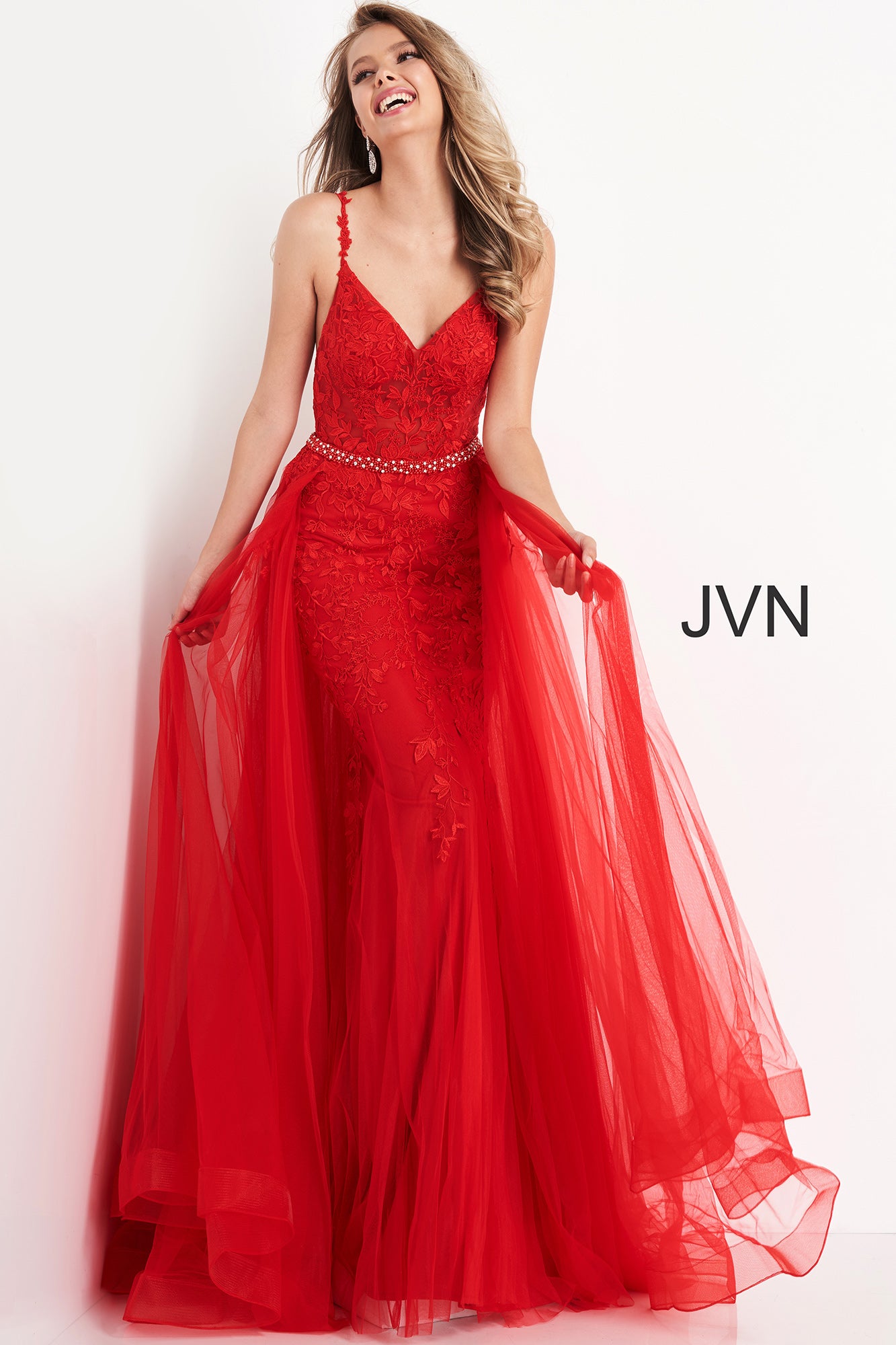 Jovani JVN02260 is a fitted Long Lace Prom Dress with a Tulle Overlay with a Crystal Embellished Waist Belt. Sheer Lace Bodice. Lace Spaghetti Straps Fitted Mermaid Flared Inner formal dress. Lace Scallop straps. Crystal beaded waist band. Prom Dresses Formal Evening gowns pageant dresses Size 10 In Off white for wedding dress or bridal gown  Available Sizes: 10  Colors: off-white  JVN by Jovani 02260
