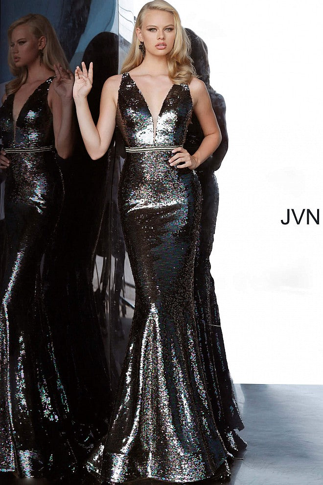 JVN 02721 is a Long Fitted Mermaid Prom Dress. Fully Embellished with multi sequins gives a Dimensional Array of colors. Stunning mermaid silhouette features a full flare skirt and small train. Deep V Plunging Neckline with embellished waistband and straps along the open back.