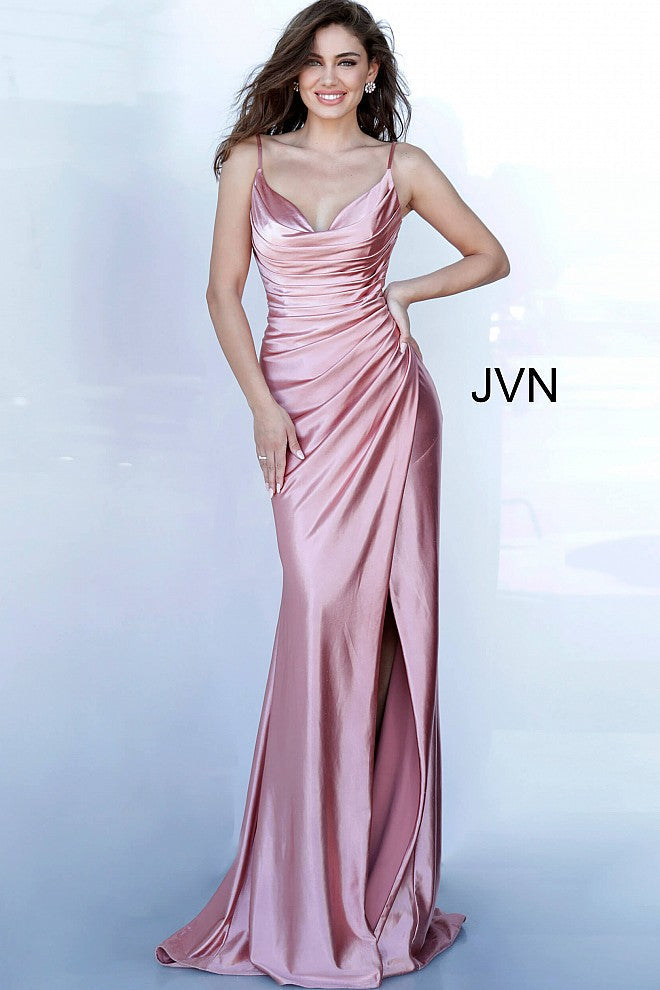 JVN03104 Dusty Pink JVN 03104 is a long fitted satin prom dress with an asymmetrical ruched bodice and classy cowl neckline. High Thigh split with a small train in the ba