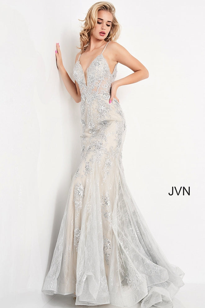 Jovani JVN06475 - JVN 06475 is a Stunning Long fitted formal evening gown. Featuring a solid lace design with floral lace appliques embellished with Beading & Sequins. Fit & Flare Mermaid silhouette with a lush sweeping trumpet skirt & Train. Sheer corset style fitted bodice with boning. open V Back. This Backless Prom dress has beaded spaghetti straps and a plunging neckline. Great Pageant Style as well! Available Sizes: 00,0,2,4,6,8,10,12,14,16,18,20,22,24  Available Colors: Silver, Black, Black/Nude