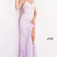 Jovani JVN06660 - JVN 06660 is a long fitted Lace formal evening gown. This Backless prom dress with a lace up corset back closure features floral lace appliques embellished with crystal rhinestones over a lace layer. Fit & Flare Silhouette with a lush sweeping train and a wide thigh slit. Available Sizes: 00,0,2,4,6,8,10,12,14,16,18,20,22,24  Available Colors: Cobalt/Blue, Lilac/White