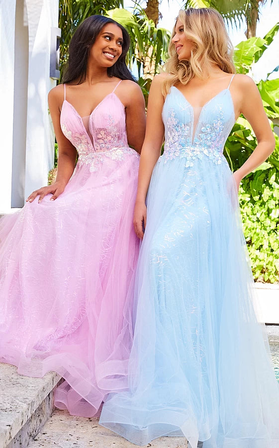 JVN07637  A Line Prom Dress.  Can you see yourself in this evening dress?  It has plunging v neckline with sheer courtesy panel.  The bodice is ruched and has floral appliques at the waistline.  The long A line skirt has horsehair trim and a glitter underlay. Lilac Blue