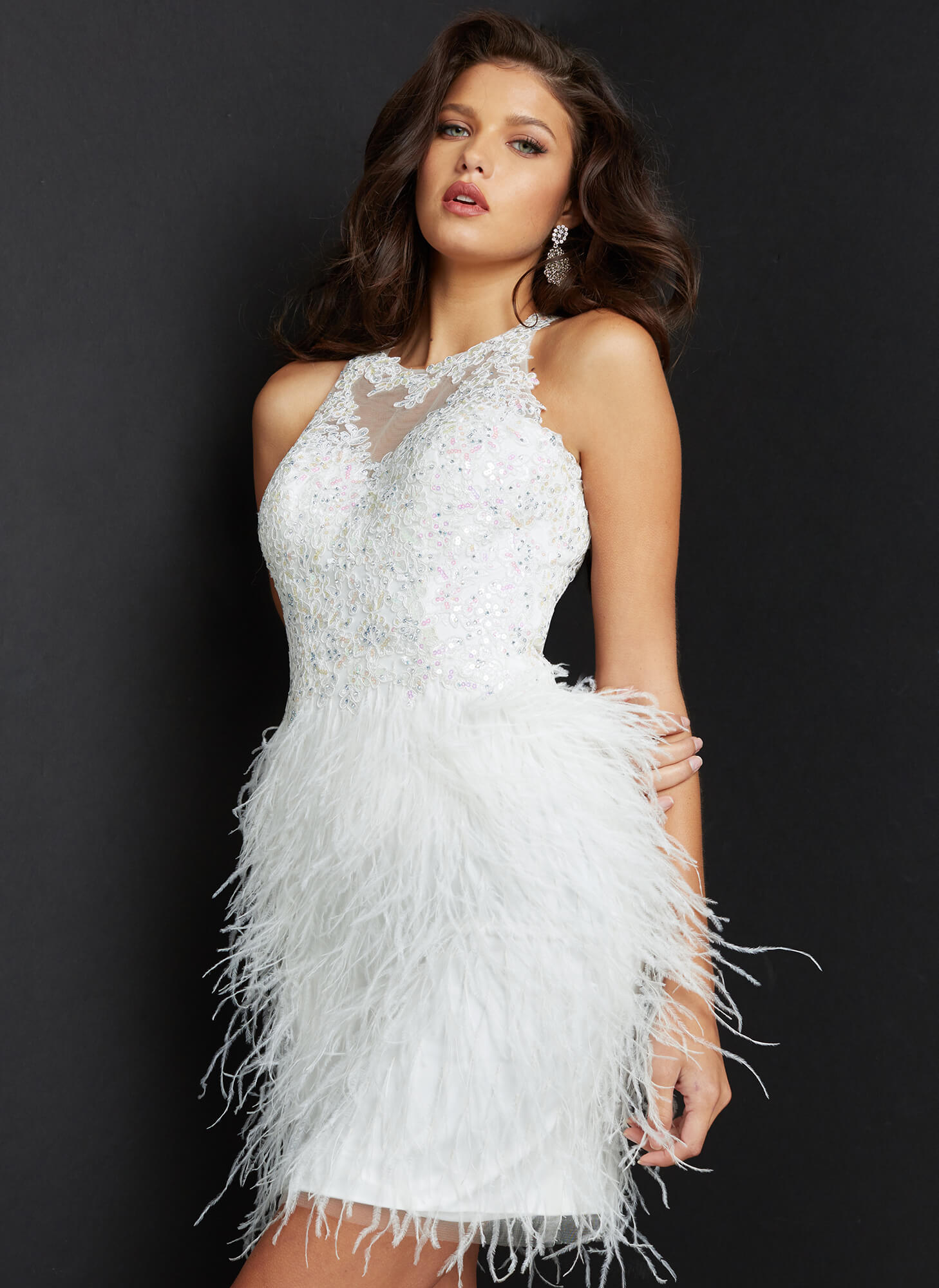 Jovani JVN07895 Feather Trimmed Lace Cocktail Dress Short Homecoming Dress.  Short form fitting off white homecoming dress features feather skirt and lace sleeveless bodice with high illusion neckline.