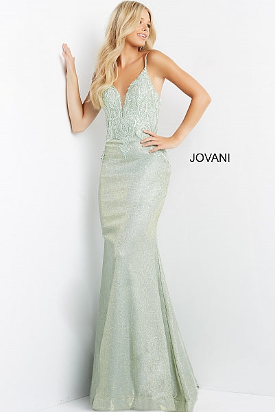 This JVN by Jovani JVN08492 light green prom gown has a fit and flare silhouette in stretch glitter, with a sheer inset plunging neckline and spaghetti straps. Tonal embroidery embellishes the bodice of this backless formal dress, finished with a horsehair hem and sweep train.  Available Sizes: 00-24  Available Colors: Light Green, Light Blue