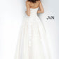 JVN 1831 is a Long Tulle Ball Gown Prom Dress with a fitted strapless bodice with floral embroidering. Embroidering cascades down into the skirt of this ballgown evening gown. 