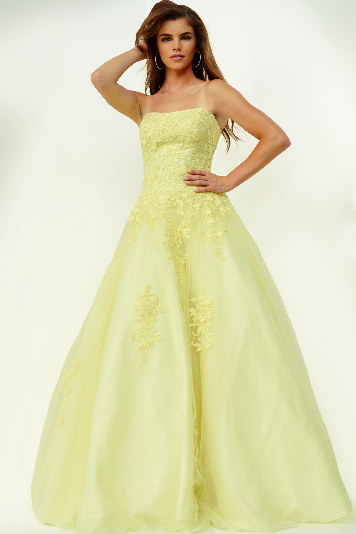 Jovani JVN1831 is a Long Tulle Ball Gown Prom Dress with a fitted strapless bodice with floral embroidering. Embroidering cascades down into the skirt of this ballgown evening gown. Also makes a perfect informal wedding dress. JVN by Jovani 1831 