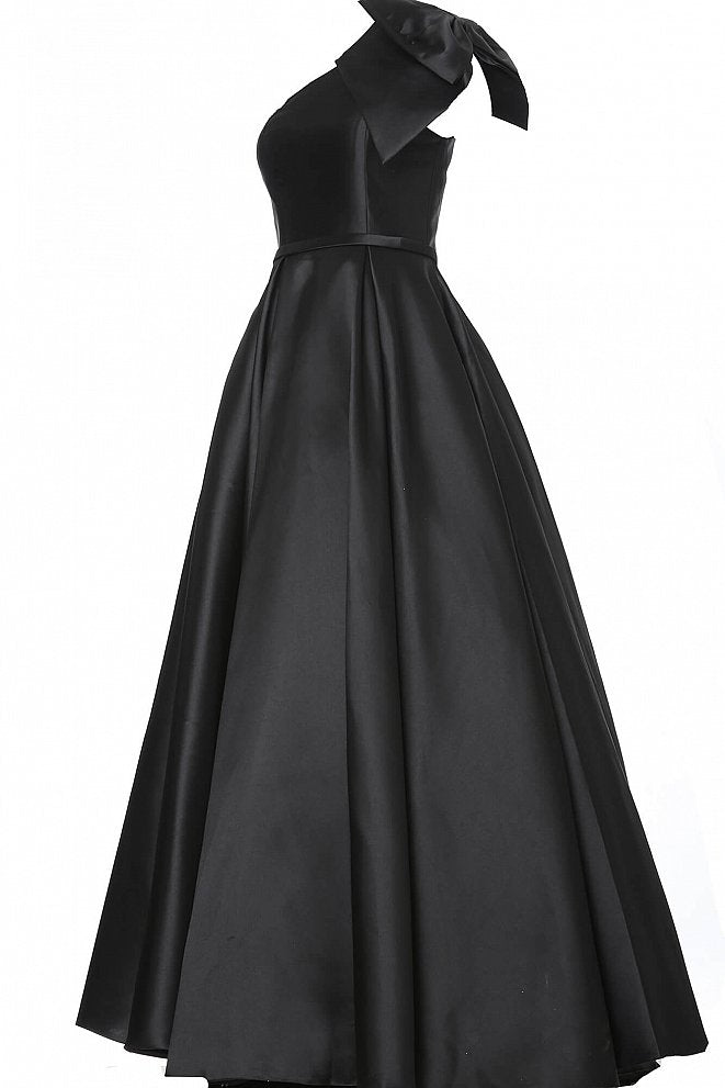 JVN4355 Black Mikado prom gown, floor length pleated A line skirt with pockets, fitted sleeveless bodice, one shoulder bodice with asymmetric neckline and bow detail on the shoulder. Evening gown 