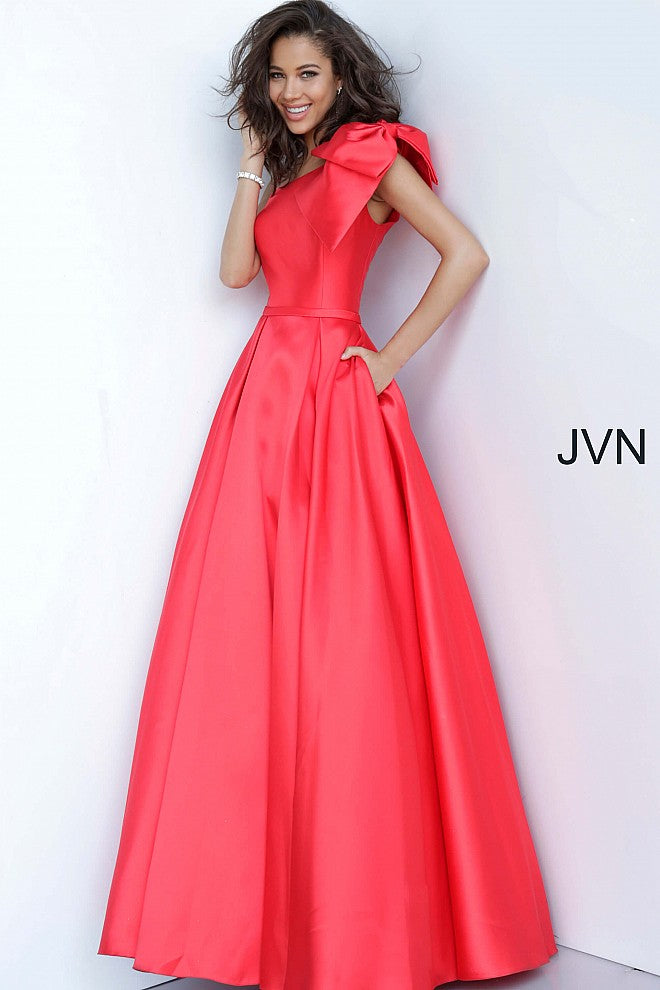 JVN4355 Red Mikado prom gown, floor length pleated A line skirt with pockets, fitted sleeveless bodice, one shoulder bodice with asymmetric neckline and bow detail on the shoulder.