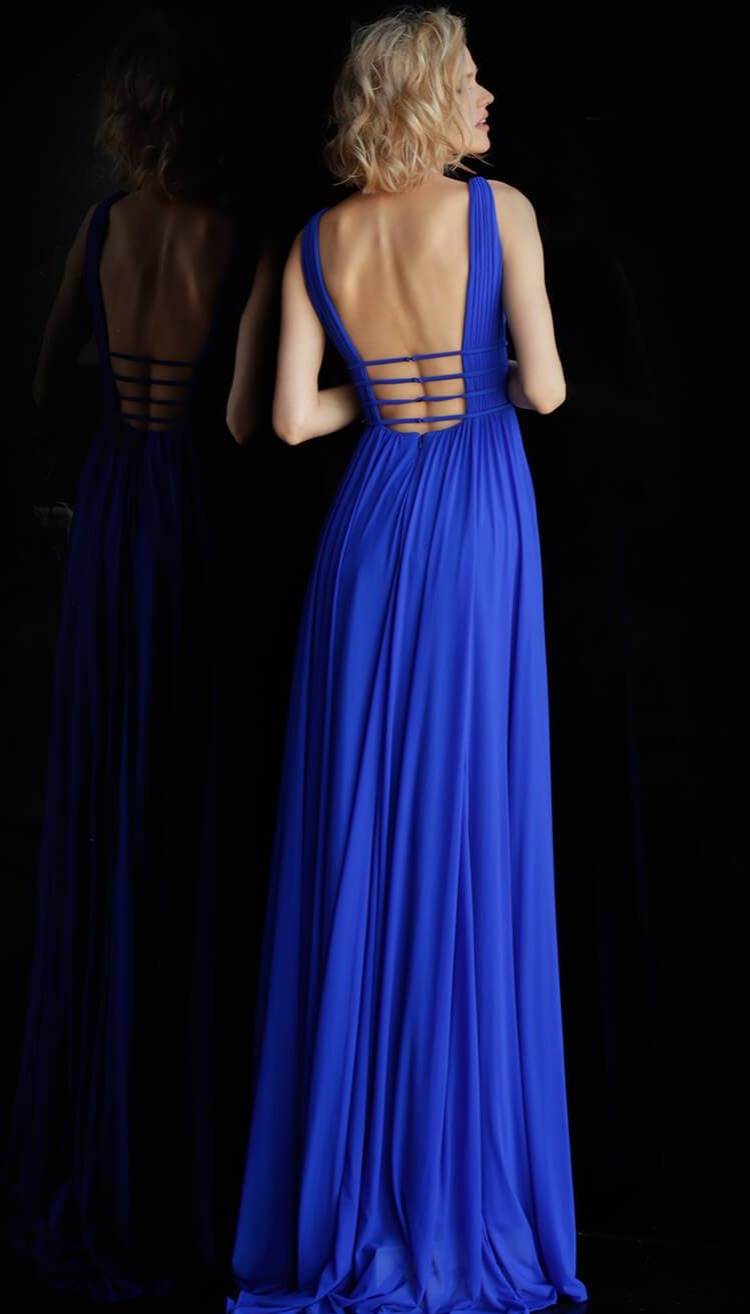 JVN52179  backless and sleeveless Stretch mesh fabric, flowy long skirt, sweeping train, sleeveless pleated bodice, four straps around the bodice with hook and eye closure on the back, plunging neckline, open back.prom dress available in royal blue Size 6